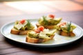 close-up of bruschettas with artichoke and parmesan