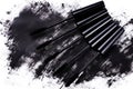 Close up of black brushes and smudged mascara Royalty Free Stock Photo