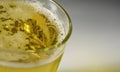 Close up Bubble froth foam of beer in glass or mug for background on top view Royalty Free Stock Photo