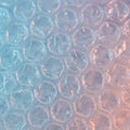 Close-up of bubble wrap, showing a pattern of uniformly-sized, clear plastic bubbles. Royalty Free Stock Photo