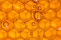 Close Up of Bubbles in Honey Comb