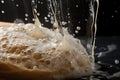 close-up of bubbling sourdough starter, with rising and falling bubbles