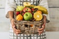 Close up of bucket full of fresh seasonal coloured fruits for healthy lifestyle and diet nutrition plan - local market shop