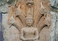 Buddha sheltered by naga hood,Seated Buddha image carving on wooden