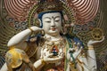 Buddha statue inside the Buddha Tooth Relic Temple in Chinatown District, Singapore Royalty Free Stock Photo