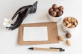 Buddha's hand holding a white flower and nuts snack Royalty Free Stock Photo