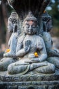 Close up buddhist statue Kathmandu Nepal. Close up of oblations of food and flowers to their gods on small statues , Kathmandu Royalty Free Stock Photo