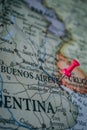 Close up of Buenos Aires pin pointed on the world map with a pink pushpin Royalty Free Stock Photo