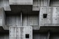 Close-up of a building showcasing the raw texture of brutalist architecture