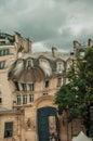 Close-up of buildings with natural distortions without post-production techniques caused by real deformations in window glass at