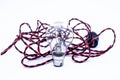 Close up of bulb with holder and red black color wire with it isolated on white