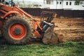 Close up of bulldozer scoop moving earth and doing landscaping works Royalty Free Stock Photo