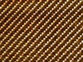 Close up bulletproof material aramid. Aramid kevlar background. Golden kevlar texture and pattern Royalty Free Stock Photo