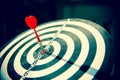 Close-up the bullseye target or or dart board has dart arrow throw hitting the center Royalty Free Stock Photo