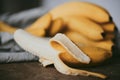 Close-up of a bunch of bananas on a dark fabric Royalty Free Stock Photo