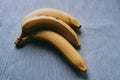 Close-up of a bunch of bananas on a dark fabric