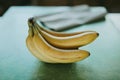 Close-up bunch of bananas on green background Royalty Free Stock Photo