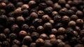 A close up of a bunch of black pepper seeds, AI