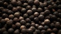 A close up of a bunch of black pepper seeds, AI