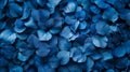 A close up of a bunch of blue flowers that are all together, AI