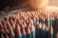 a close up of a bunch of colored pencils with a blurry background