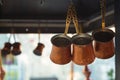 Close up of a bunch of copper coffee jezve pots hanged up in a market in Istanbul Royalty Free Stock Photo