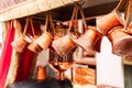 Close up of a bunch of copper coffee pots hanged up in a market in Istanbul Royalty Free Stock Photo