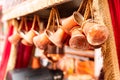 Close up of a bunch of copper coffee pots hanged up in a market in Istanbul Royalty Free Stock Photo