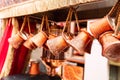 Close up of a bunch of copper coffee pots hanged up in a market in Istanbul Royalty Free Stock Photo