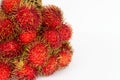 Close up a bunch of delicious red rambutan from rambutan tree isolated on white background with clipping path.Famous fruit from Th