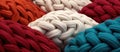 a close up of a bunch of different colored knitted blankets Royalty Free Stock Photo