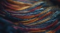 a close up of a bunch of different colored thread on a table top with a blurry image of the thread on the table top of the yarn