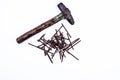 Close up bunch of rusted needle and hammer isolated on white.