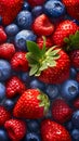 A close up of a bunch of strawberries and blueberries Royalty Free Stock Photo