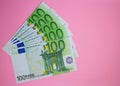close up bundle of money Euros banknotes on the color background