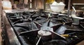 Dirty gas stove top after cooking Royalty Free Stock Photo