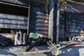 Close up Burned damaged ruins of destroyed supermarket metallic facade arson investigation insurance