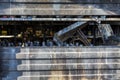 Close up Burned damaged ruins of destroyed supermarket metallic facade arson investigation insurance