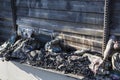 Close up Burned damaged ruins of destroyed supermarket metallic facade arson investigation insurance