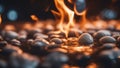 close up of a burning A fire burning coals crackled and hissed, sending sparks and smoke into the air. Royalty Free Stock Photo