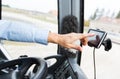 Close up of bus driver driving with gps navigator Royalty Free Stock Photo