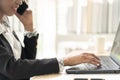 Close up of Business African American woman working sitting at her desk Royalty Free Stock Photo