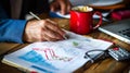 close-up of a business analytics workspace which includes a person analyzing a financial graph with a pen in hand.. AI Royalty Free Stock Photo