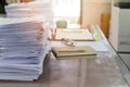 Close up of business documents stack on desk , report papers stack Royalty Free Stock Photo