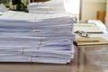 Close up of business documents stack on desk , report papers stack Royalty Free Stock Photo