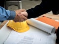 Close-up of business engineer planing at construction site project, documents, worker tool Royalty Free Stock Photo