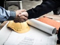 Close-up of business engineer planing at construction site project, documents, worker tool Royalty Free Stock Photo