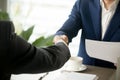 Close up of business handshake, male hands shaking after signing Royalty Free Stock Photo