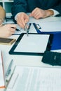 Close-up the business man hand pointing at the tblank tablet screen. Teamwork successful meeting. Royalty Free Stock Photo