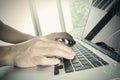 Close up of business man hand working on laptop computer Royalty Free Stock Photo